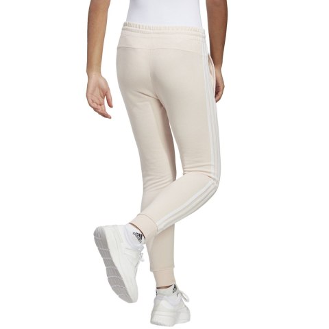 Spodnie damskie adidas Essentials 3-Stripes French Terry Cuffed kremowe IC9924 Spodnie damskie adidas Essentials 3-Stripes French Terry Cuffed kremowe IC9924